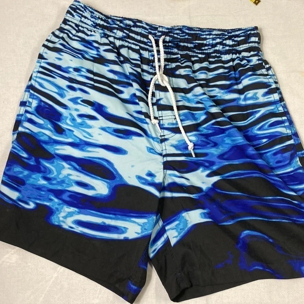 Joe Boxer Men’s Swim Trunks size Medium. (BE)